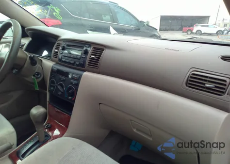 2005 Toyota Corolla Le z USA, uszkodzony, nr VIN JTDBR32EX52056063